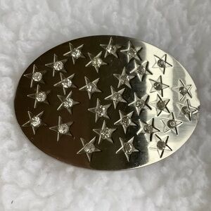 Silver Toned Star-Studded Oval Belt Buckle Made in Italy.